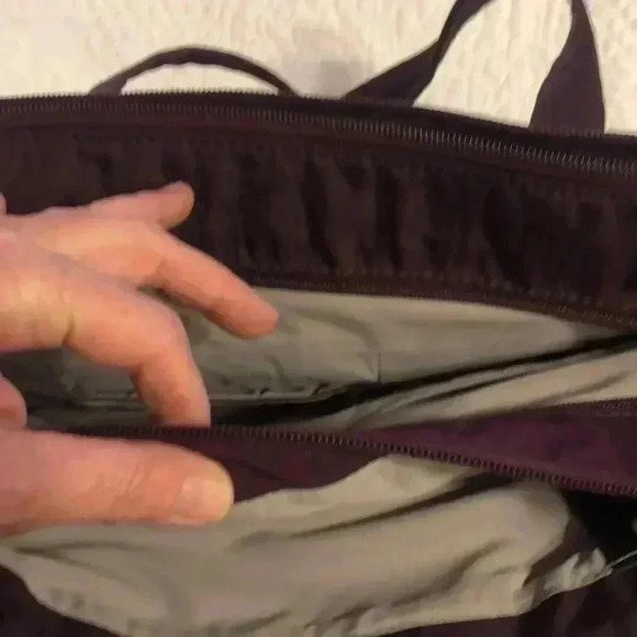 Magellan’s purple nylon shoulder bag. - Picture 5 of 12